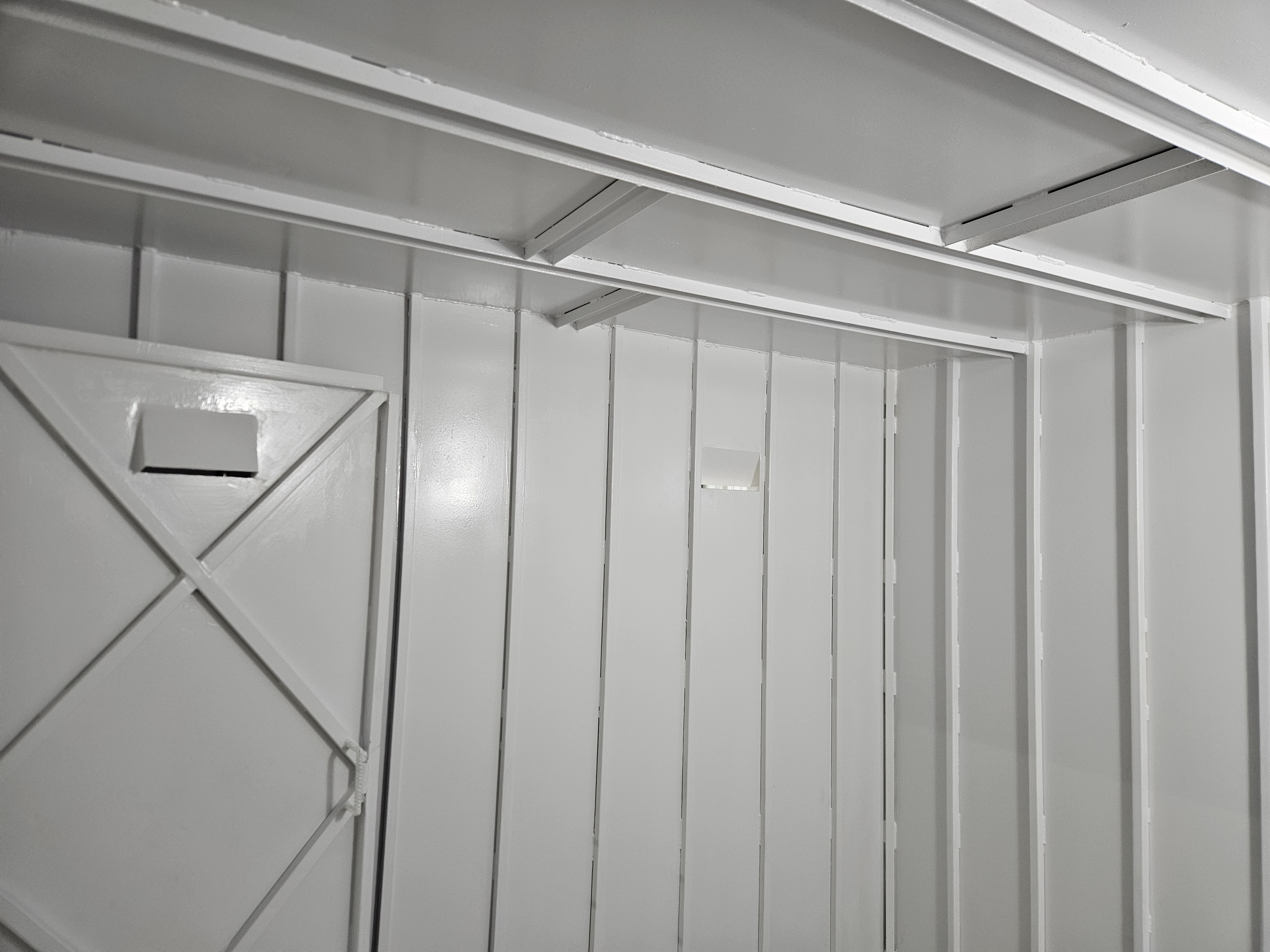 Finished interior — painted white with ventilation